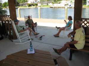 group under gazebo with drinks