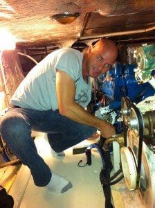Randy in the engine room battling the bilge Randy in the engine room battling the bilge