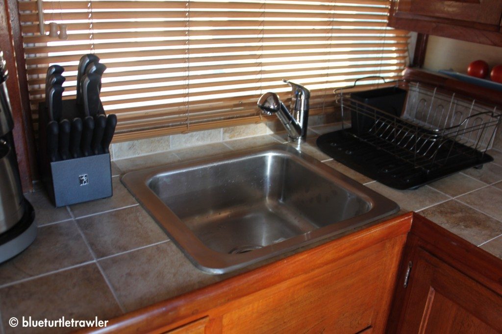 AFTER: sink is dropped in and new faucet 