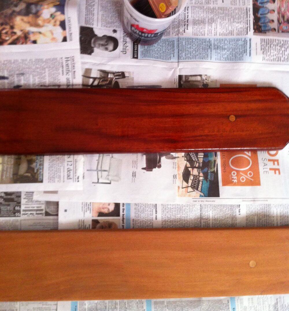 The bare wood (bottom) name board and one varnished with Captain's Varnish (top)