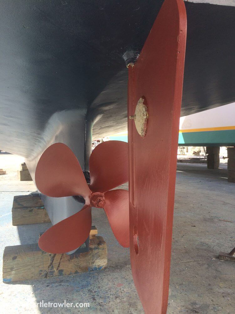 Prop and rudder looking good as new and painted red